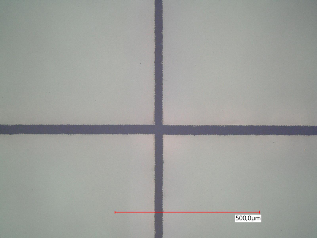 Laser dicing of optical devices